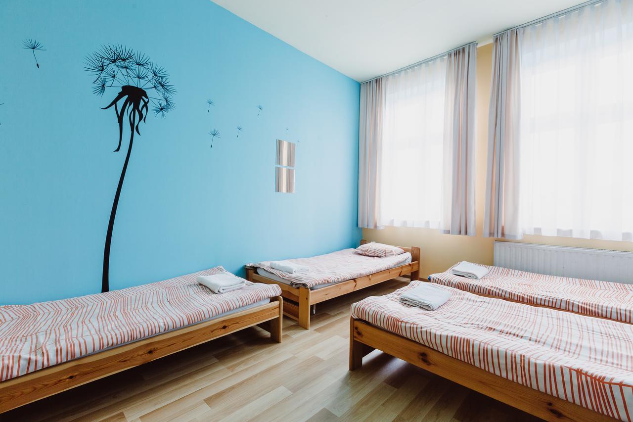 Pokój Czteroosobowy ze wspólną łazienką